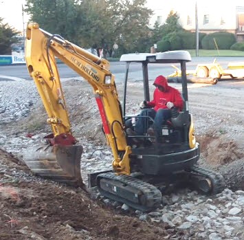 Mini Excavator to Reshape the Grade