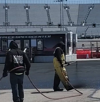 Asphalt Sealer Applied With a Spray Wand